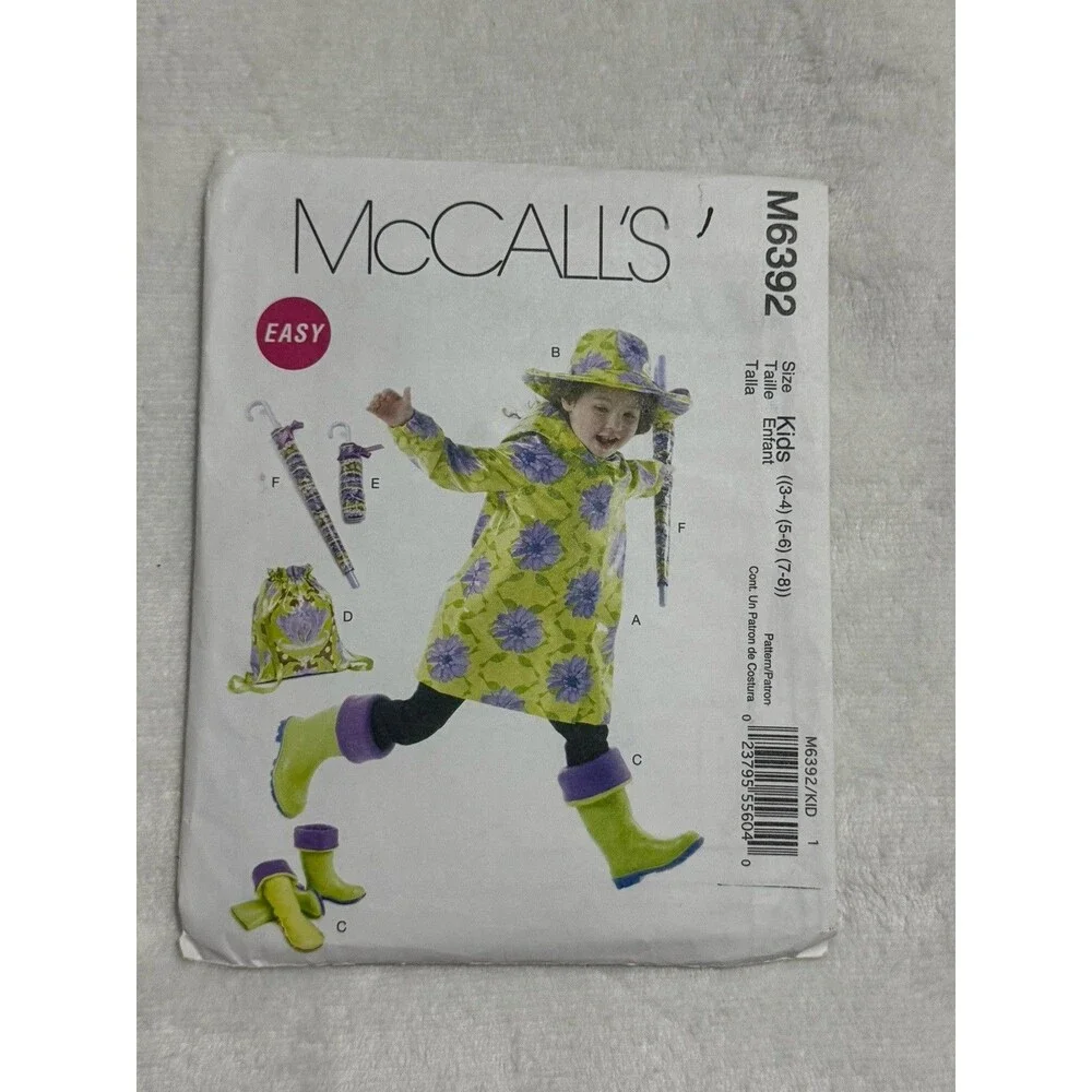 McCalls M6392 Sewing Pattern Kids Size 3 - 8 Raincoat Hat Backpack Boot Liners